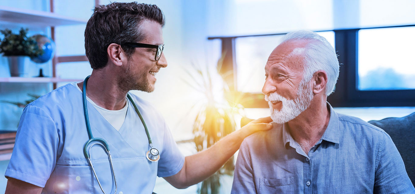 Positive clinician engaging with male patient